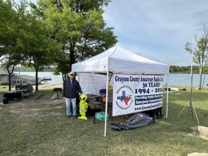 Eclipse-Day-banner-and-booth-scaled