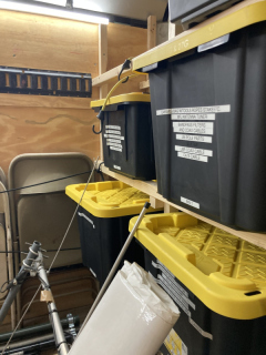 Bungee cord holding bin